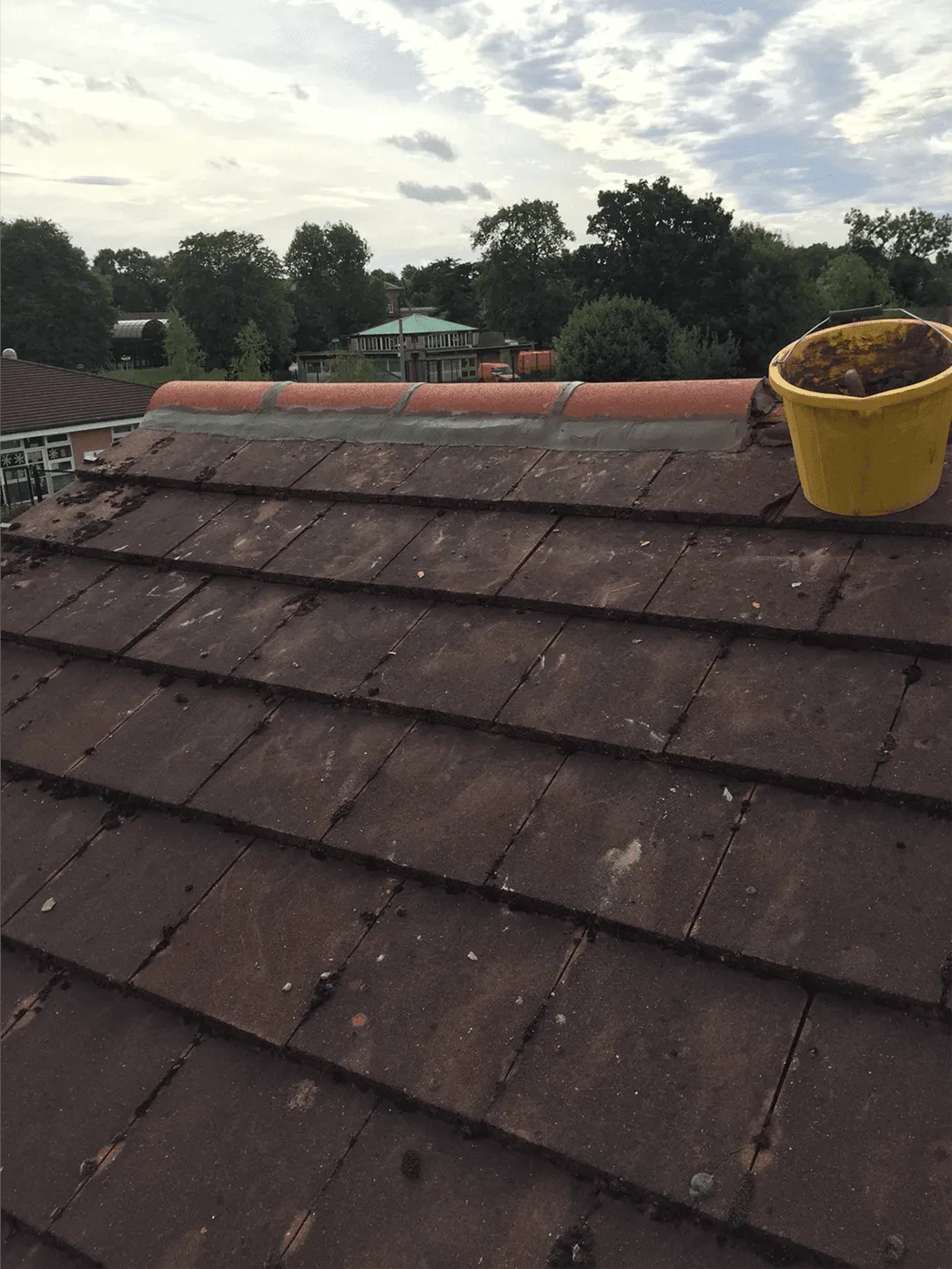 Roof ridge rebedding work in progress